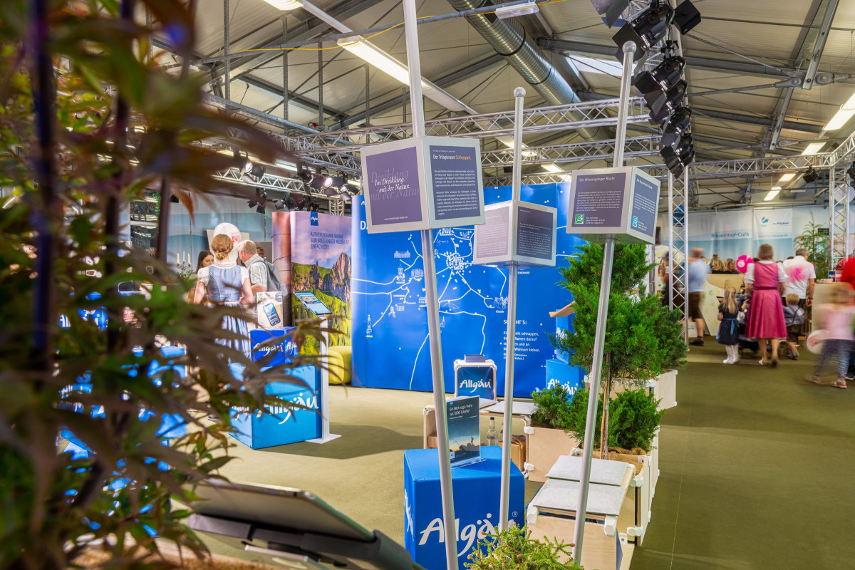 View of the Allgäu booth with information areas and regional design.