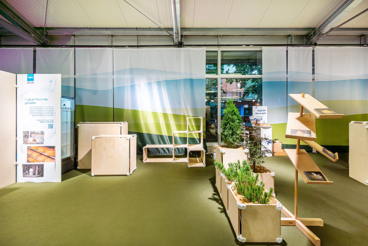Quiet seating area with plants and furniture as a retreat at the festival week.