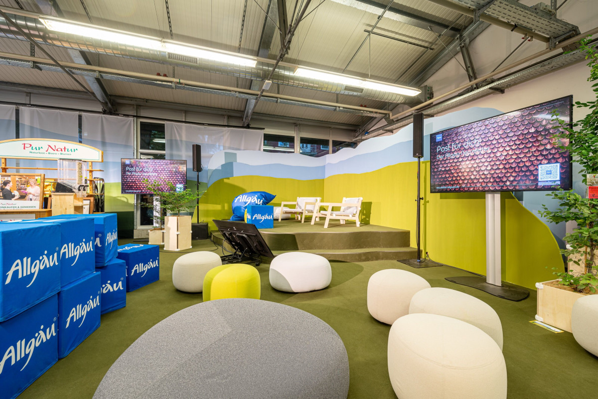 Seating area with lounge chairs and alphorns at the festival week.
