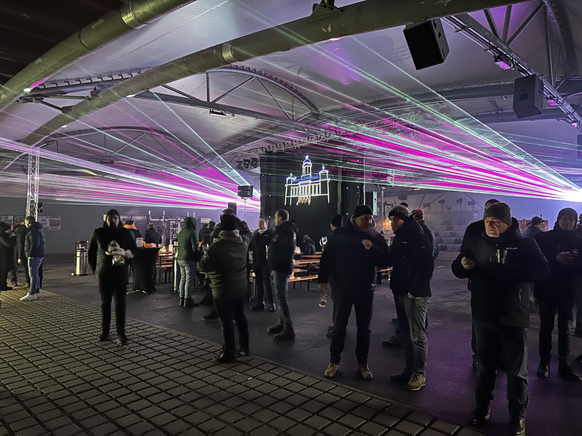 Participants surrounded by the highlight of the laser show.