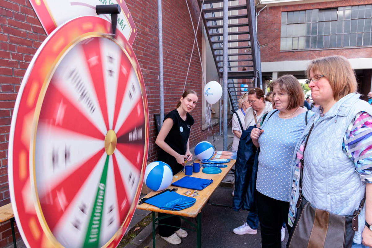 Game and activity station with a wheel of fortune in the outdoor area.