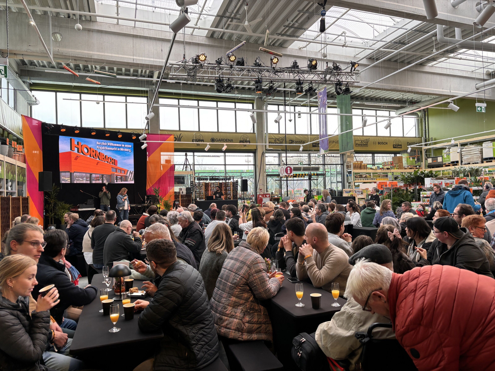 Visitors attending the official HORNBACH store opening ceremony