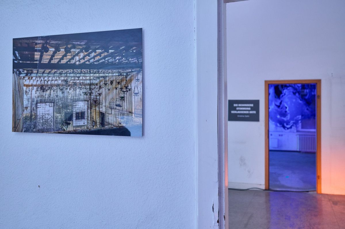 Former colliery rooms with an art exhibition, fitting the vacant industrial spaces.