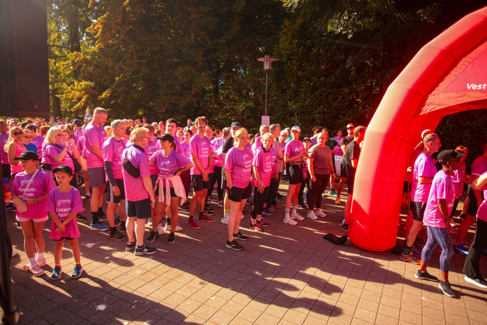 Runners gather in the starting area of the Proselis breast cancer charity run.